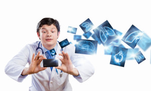 Photo credit: "Young funny doctor taking photos with mobile phone camera" // ShutterStock